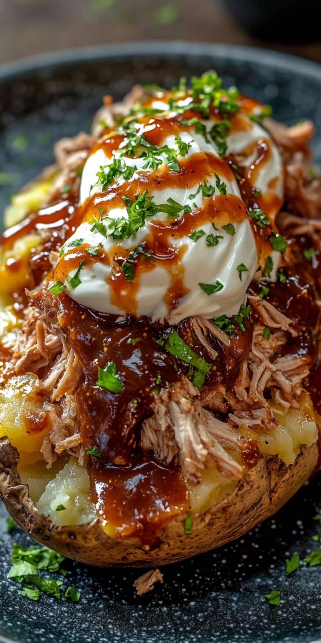 Loaded Pulled Pork Baked Potatoes